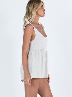 Romper Tie shoulders Wide neckline Twin hip pockets Invisible zip fastening at side Relaxed fitting