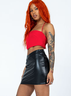   side view of model wearing Princess Polly Genesis Mini Skirt Black Mini Skirts 