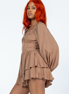 Romper Elasticated neckline  Boning through waist Shirred waistband at back  Layered skirt 