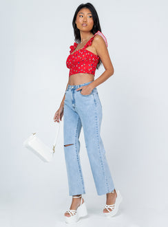 side view of model wearing Princess Polly Daysia Lightwash Denim Jeans High Waisted 