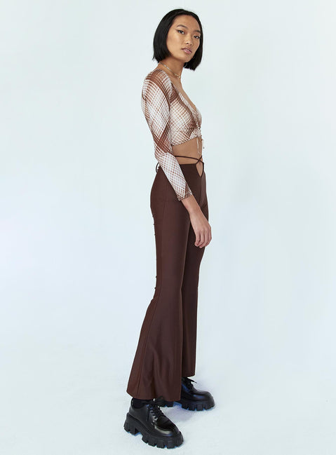 side view of model wearing Princess Polly Cooper Tie Waist Pants Brown 