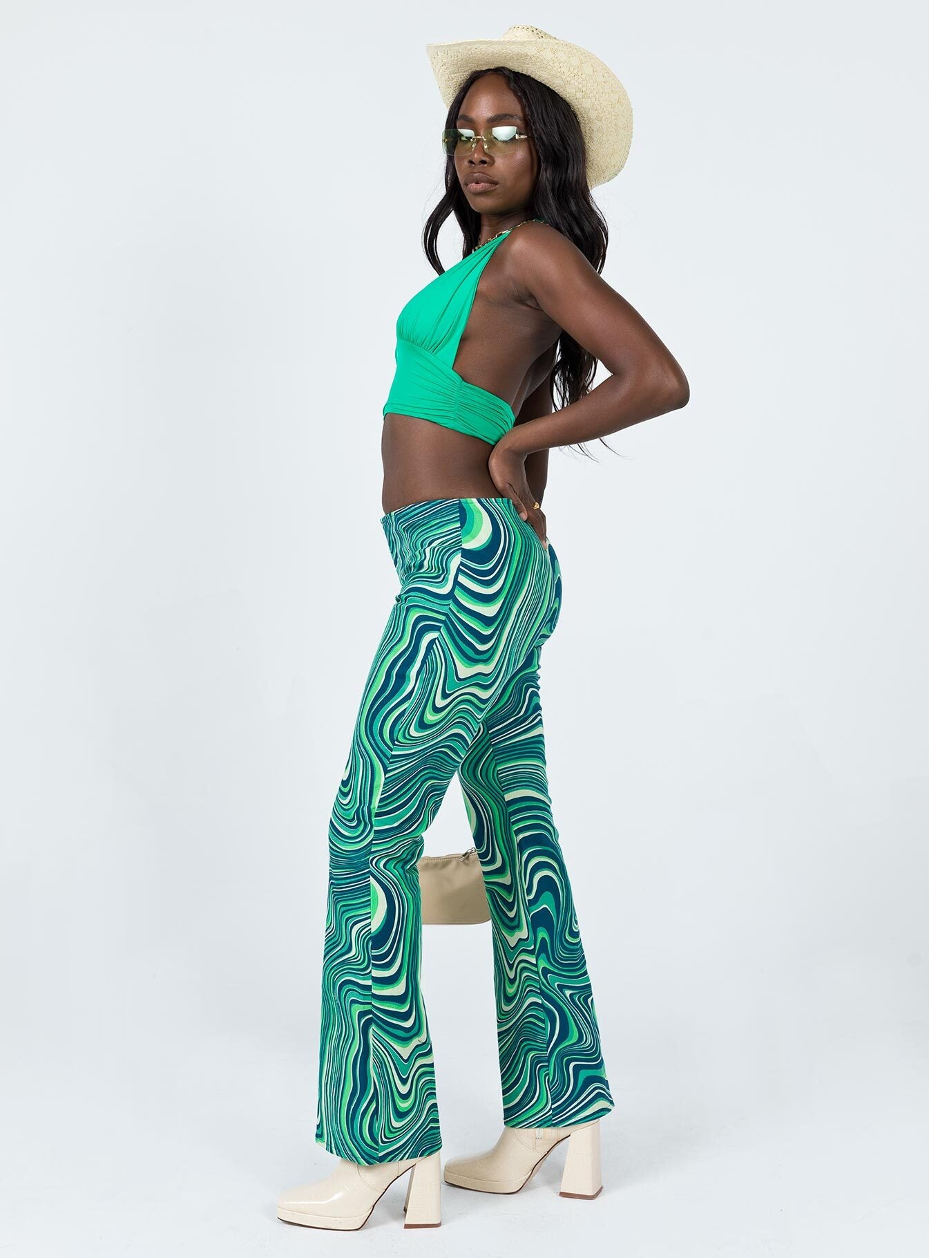 side view of model wearing Princess Polly Motel Coban Trouser 70s Ripple Green 