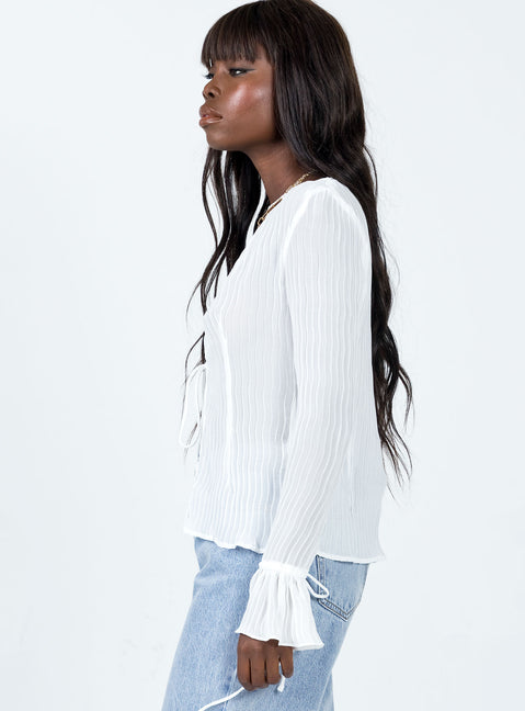 side view of model wearing Princess Polly Brody Long Sleeve Top White 
