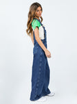 Overalls Dark wash denim  Embroidered graphic at chest  Adjustable shoulder straps Chest & leg pockets Four classic pockets  Button fastening at hips Wide leg 