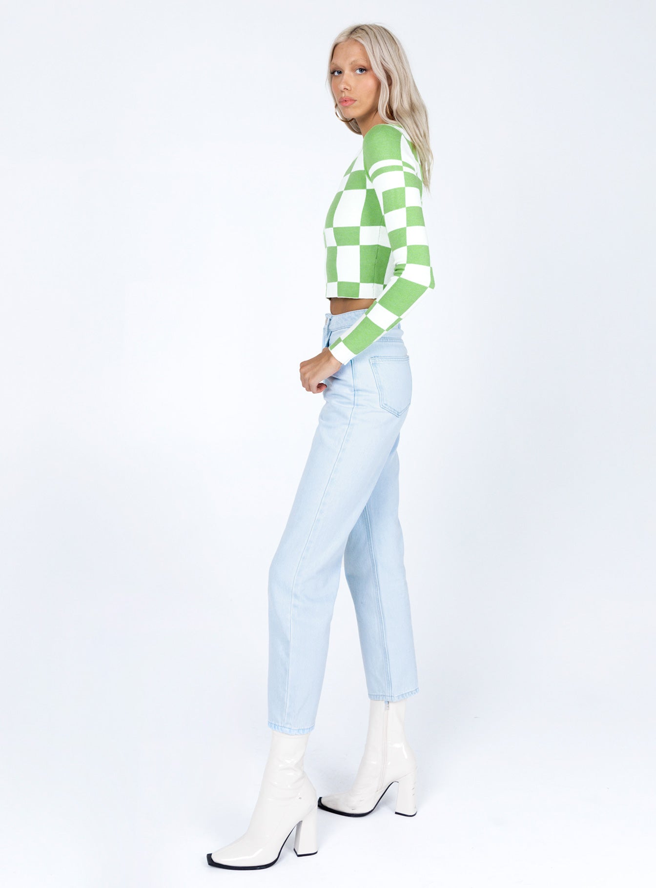 side view of model wearing Princess Polly Palermo Straight Leg Light Wash Denim Jeans Mid Rise 