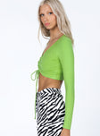 side view of model wearing Princess Polly Hudson Long Sleeve Top Green 