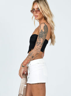 back view of model wearing Princess Polly Tersa Mini Skirt White Mini Skirts 