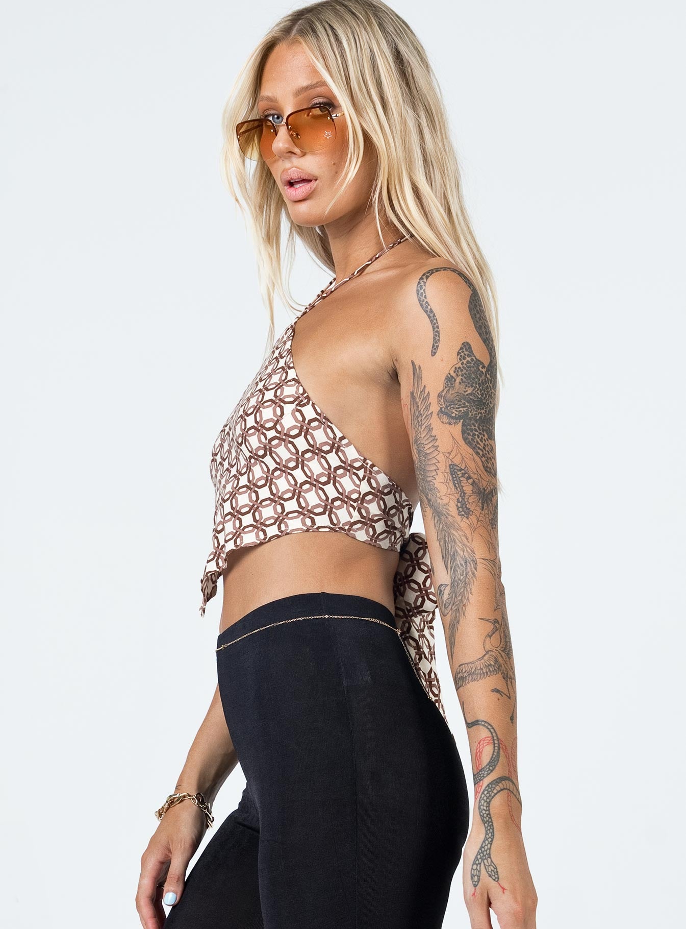 side view of model wearing Princess Polly Motel Mauda Top Chain Tangle Beige 