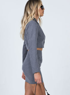   side view of model wearing Princess Polly Claremont Mini Skirt Grey 