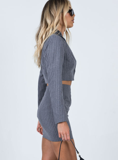   side view of model wearing Princess Polly Claremont Mini Skirt Grey 