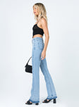 side view of model wearing Princess Polly Nikaia Denim Jeans Mid Rise 