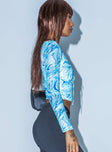 side view of model wearing Princess Polly Nikola Long Sleeve Top Blue 