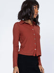 side view of model wearing Princess Polly Blanca Long Sleeve Top Brown 