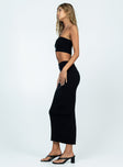 Black matching set Knit material  Strapless crop top  High waisted midi skirt  Elasticated waistband  Back slit 