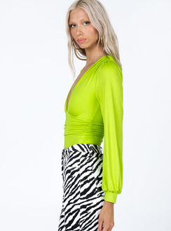 side view of model wearing Princess Polly Jude Long Sleeve Bodysuit Green Full Sleeves Plunger 