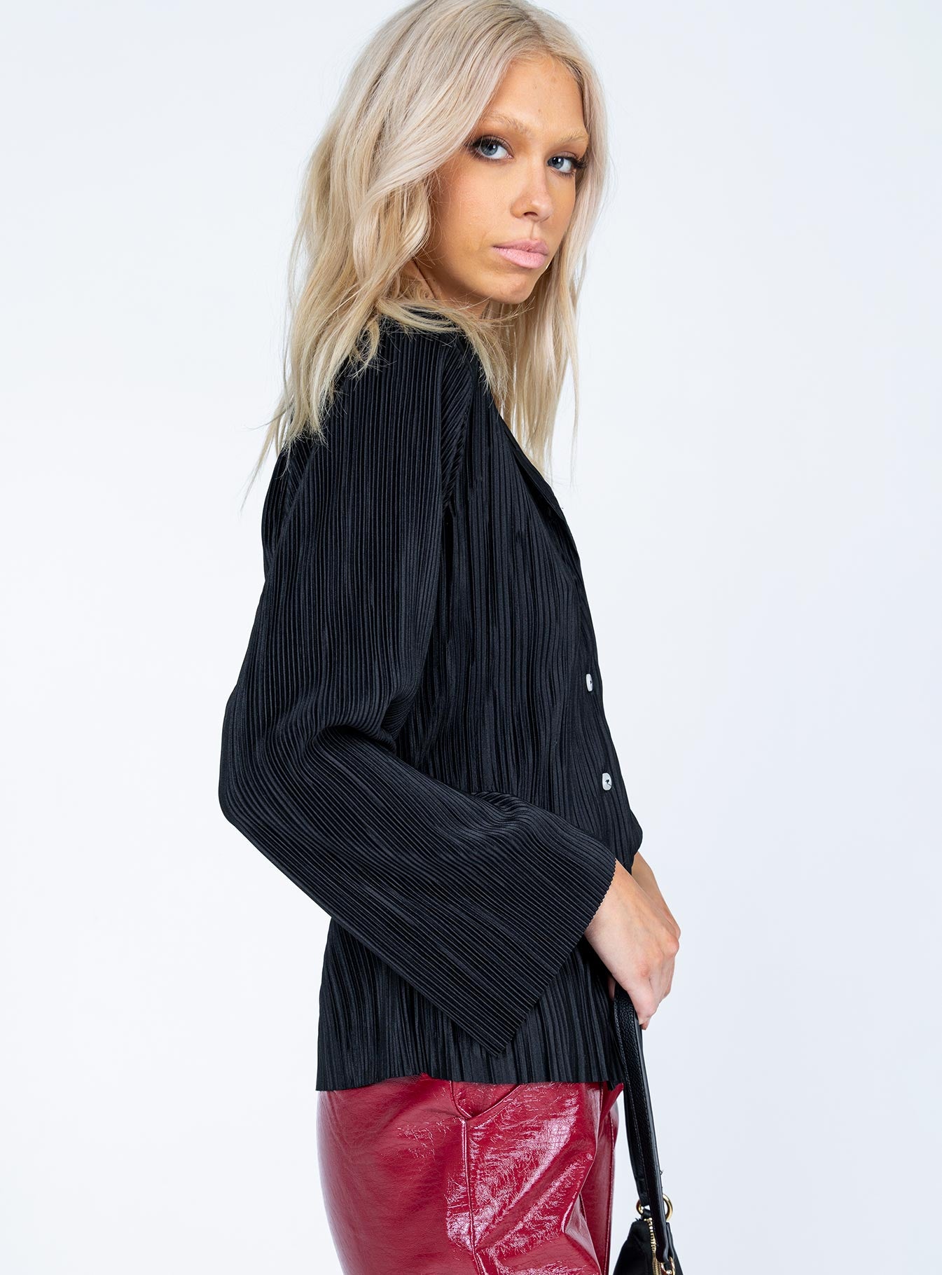 side view of model wearing Princess Polly Louie Pleated Shirt Black 