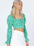 front view of model wearing Princess Polly Rylee Long Sleeve Top Green Floral 