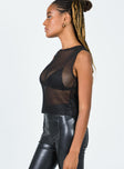 side view of model wearing Princess Polly Almost Famous Top Black 