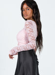 Long sleeve top Lace material Wrap style top Tie fastening Scoop neck Good Stretch Lined body