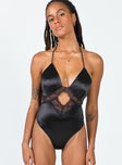 side view of model wearing Princess Polly Zella Bodysuit Black Sleeveless Plunger 