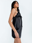 side view of model wearing Princess Polly Julia Mini Dress Black Sweetheart Neckline 