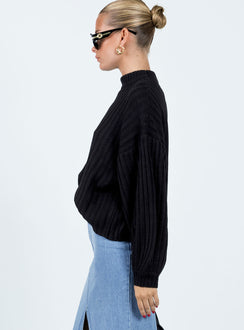 side view of model wearing Princess Polly Innerbloom Oversized Sweater Black Cropped 