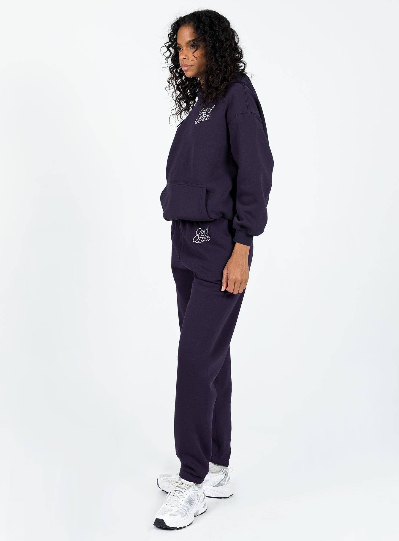 Front view of model wearing  front Princess Polly High Waisted Pants  Out Of Office Tracksuit Pants Navy