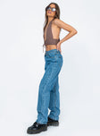 side view of model wearing Princess Polly Holly Asymmetric Straight Leg Jean Mid Wash Denim Mid Rise 