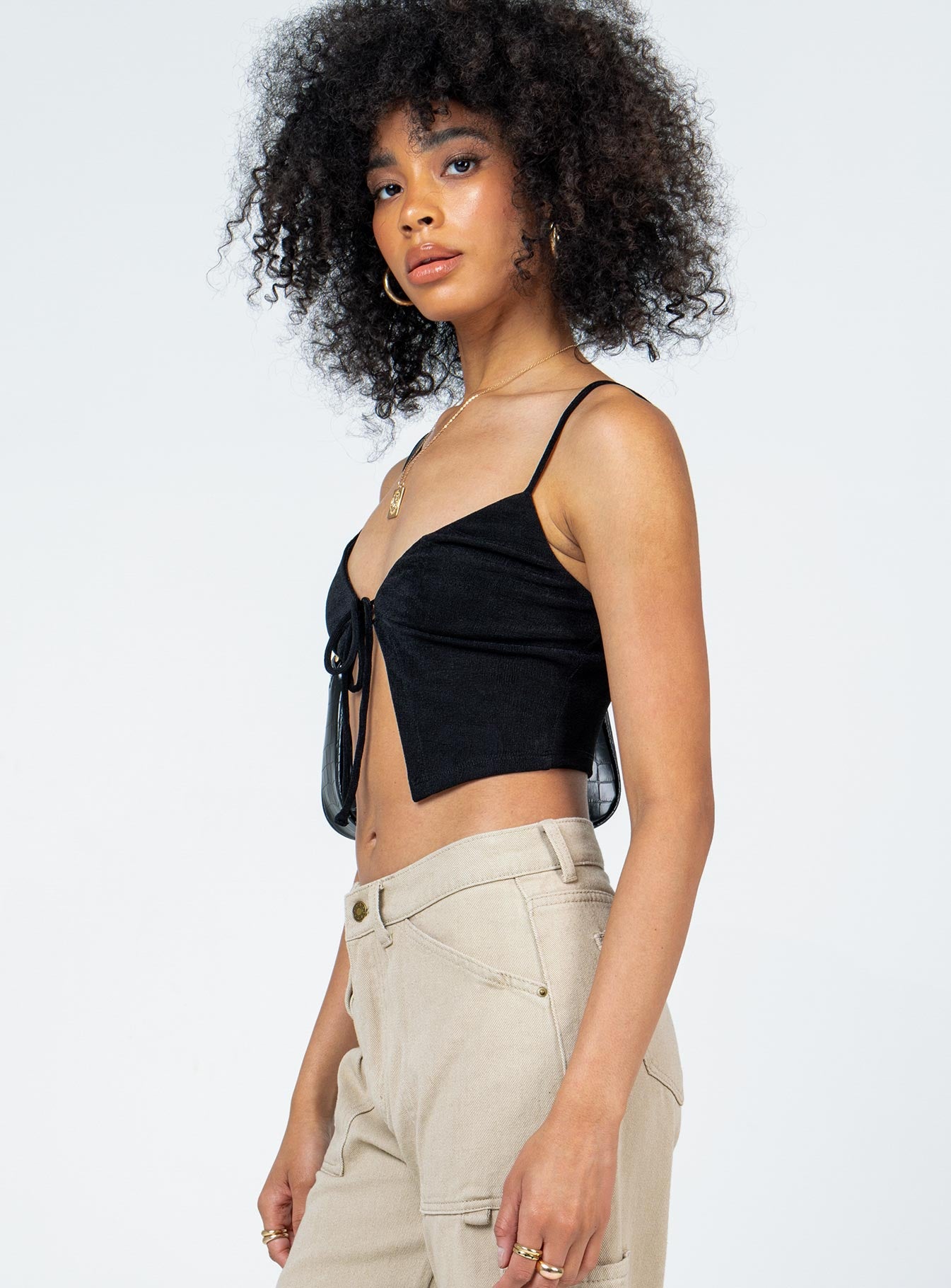 side view of model wearing Princess Polly Mayson Top Black 