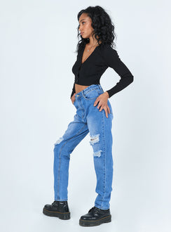 side view of model wearing Princess Polly Lisbon Ripped Denim Jeans Mid Rise 