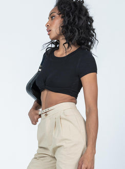 side view of model wearing Princess Polly Brookfield Top Black Short Sleeves Crew Neck 