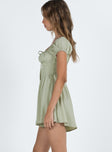 Green romper Cap sleeve Ruched bust Tie detail Shirred back band Invisible zip fastening at side Boning through front Ruched waist