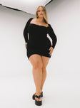 side view of model wearing Princess Polly Nolan Mini Dress Black Curve Square Neck 