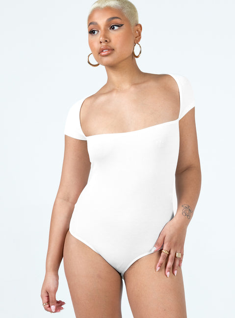 side view of model wearing Princess Polly Langley Bodysuit White Short Sleeves Square Neck 