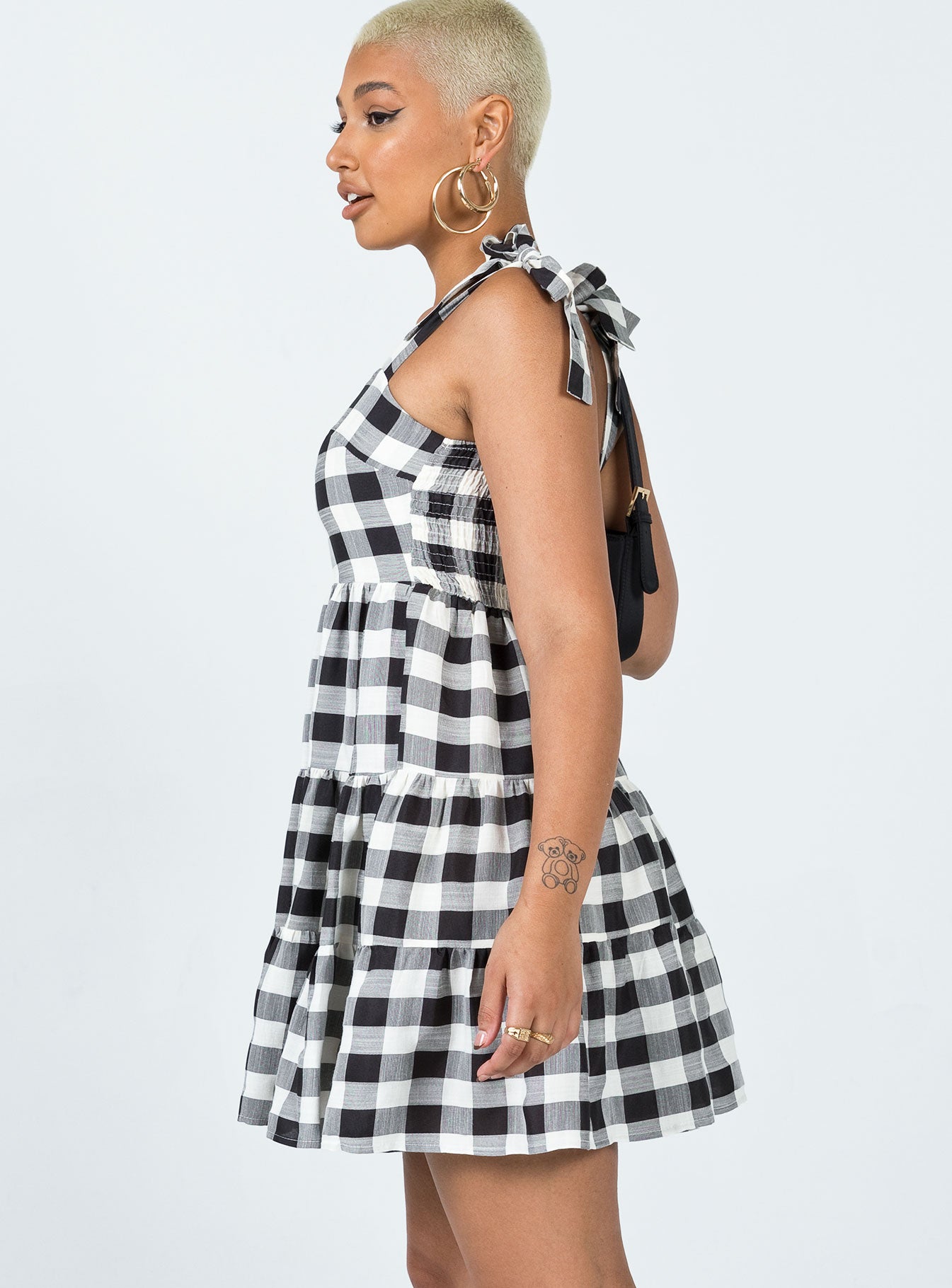 side view of model wearing Princess Polly Rae Mini Dress Black / White 