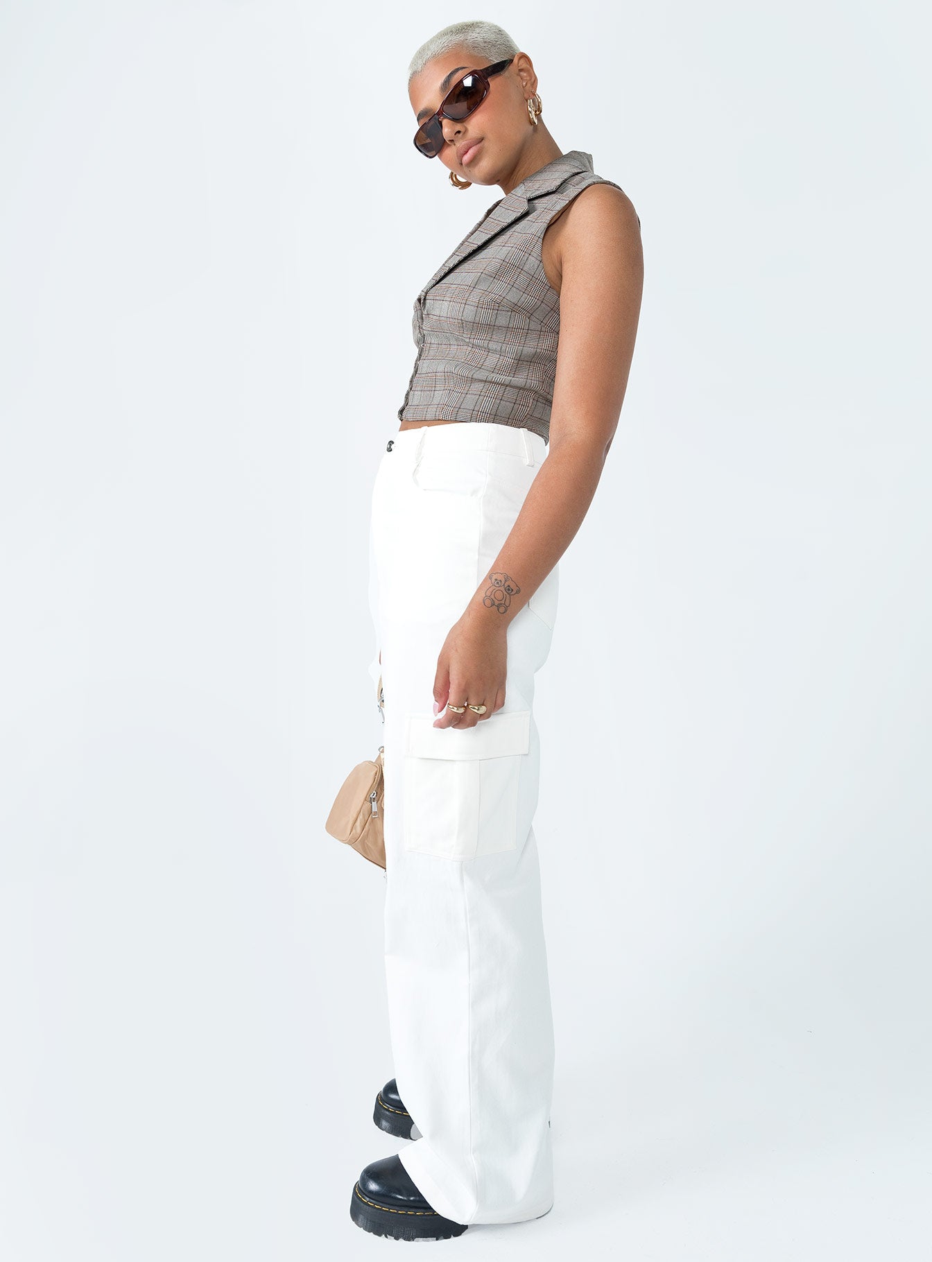 side view of model wearing Princess Polly Alesiha Jean White High Waisted 