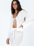 White long sleeve top Crochet material Wide neckline Tie fastening at bust Good stretch
