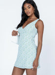 side view of model wearing Princess Polly Harlen Mini Dress Blue / White Floral V-Neck 