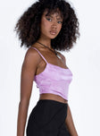 Crop top Shimmery material Adjustable shoulder straps Scooped neckline Tie fastening at back