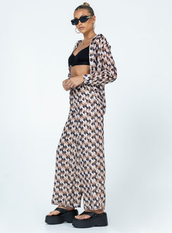 Matching set Sheer material  Geometric print  Button up shirt  High waisted pants  Elasticated drawstring waistband  Wide leg