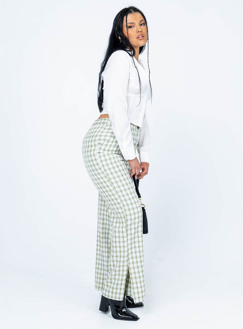 side view of model wearing Princess Polly Ringo Pants Green 