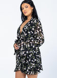 side view of model wearing Princess Polly Marty Long Sleeve Mini Dress Black Floral 