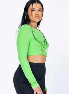 side view of model wearing Princess Polly Astrid Long Sleeve Top Green 