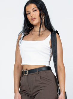 side view of model wearing Princess Polly Jace Top White Sleeveless Square Neck 