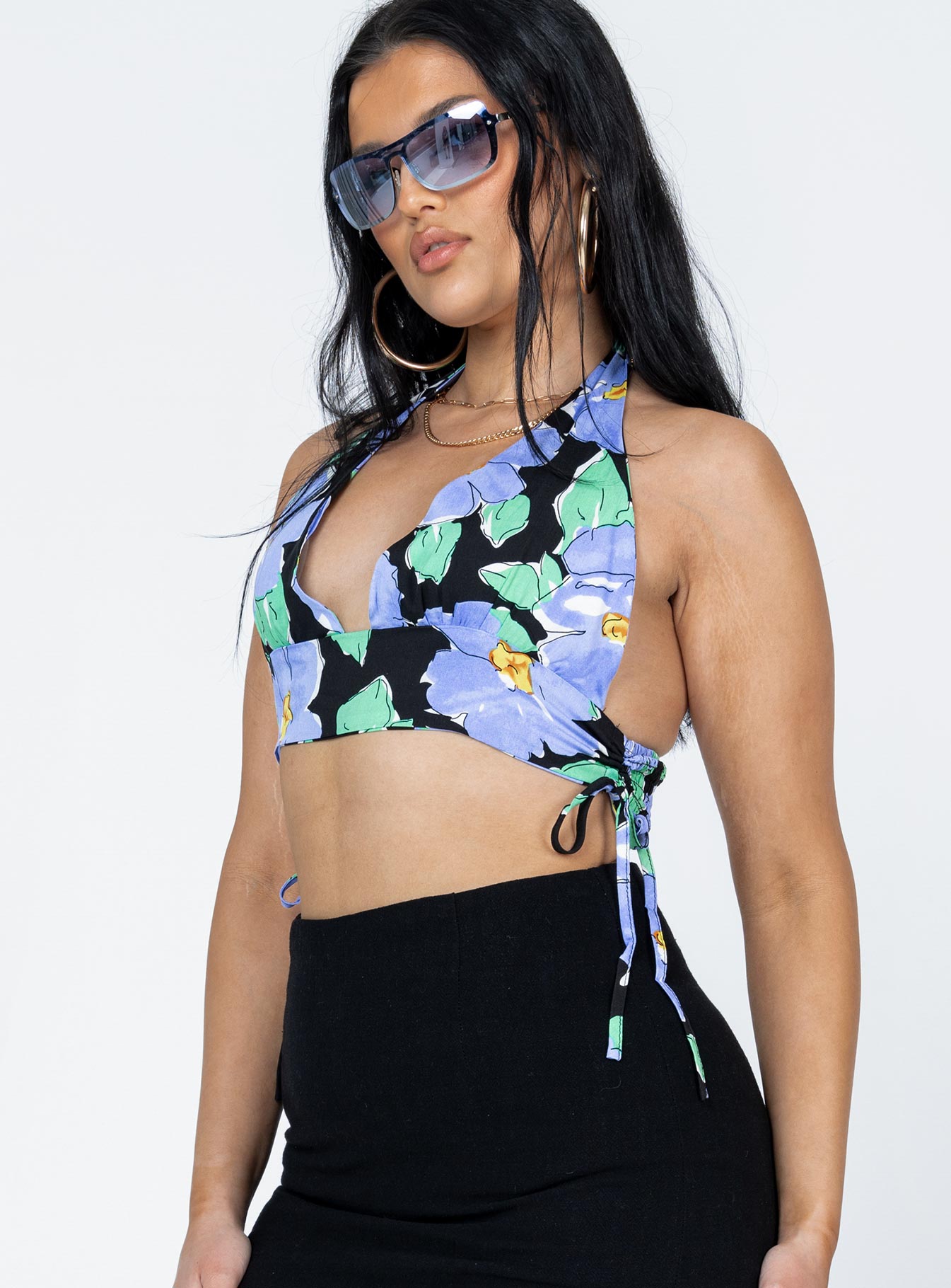 side view of model wearing Princess Polly Meadowbank Top Black / Blue Sleeveless V-Neck 