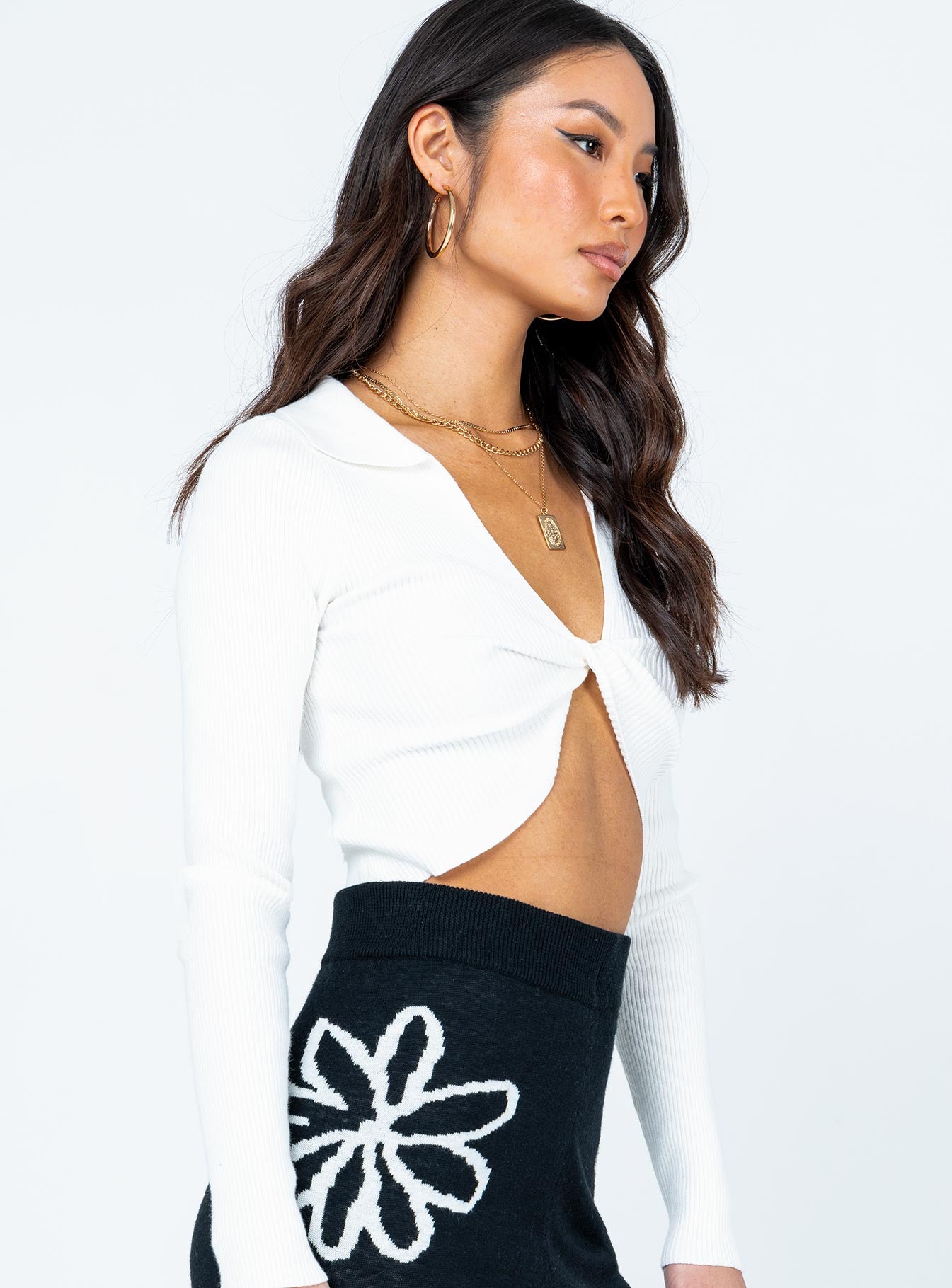 side view of model wearing Princess Polly Emberly Long Sleeve Top White 