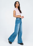 side view of model wearing Princess Polly Mora Wide Leg Denim Jeans Mid Rise 