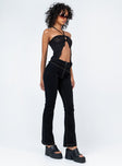 side view of model wearing Princess Polly Zia Flare Pants Black 