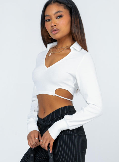 side view of model wearing Princess Polly Corbin Long Sleeve Top White 