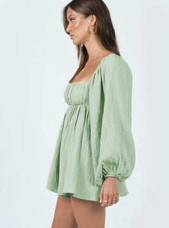 Romper Muslin material Square neckline Padded cups Elasticated shoulders & cuffs Low back Adjustable lace up fastening at back Non-stretch